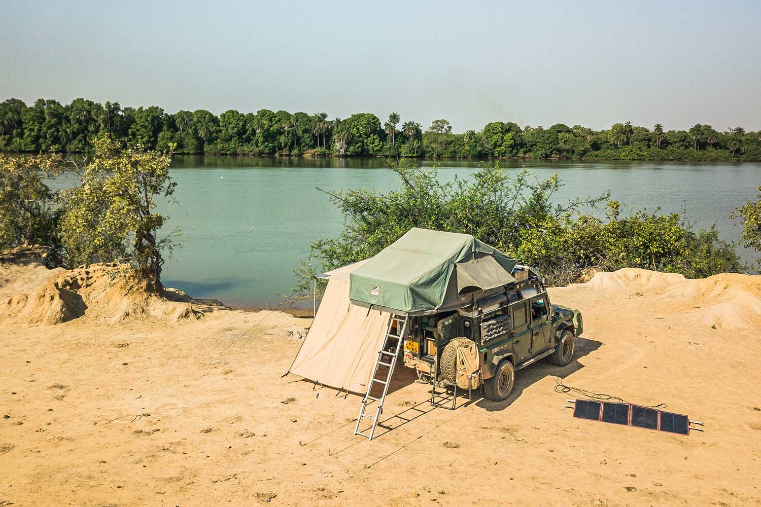 ARB Touring 2500x2500 awning in use on overlander camp Gambia