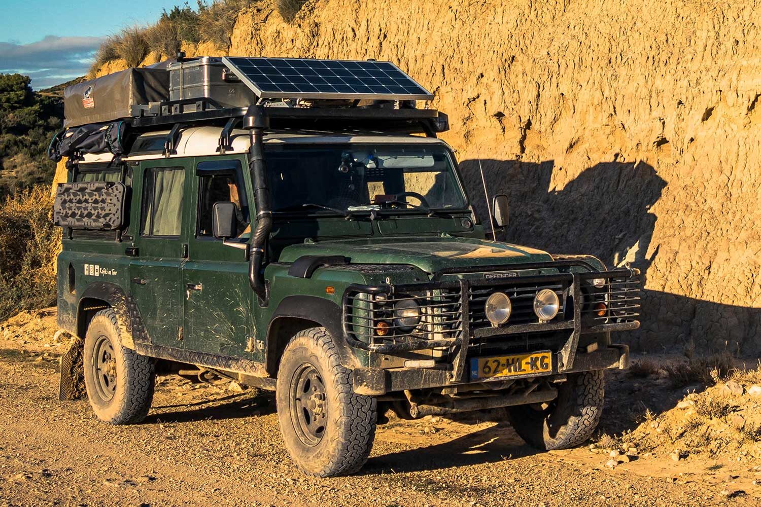 Tembo 4x4 aluminium roofrack on a Defender 110 fully loaded