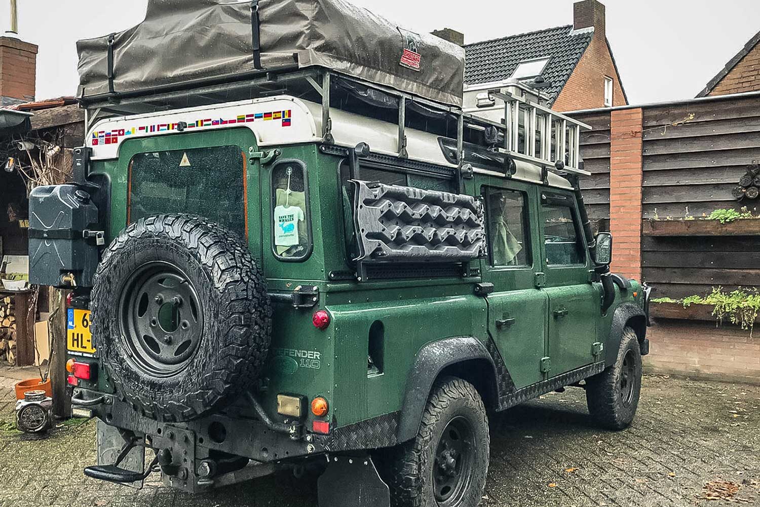 Tred Pro recovery boards mounted on the overland Defender