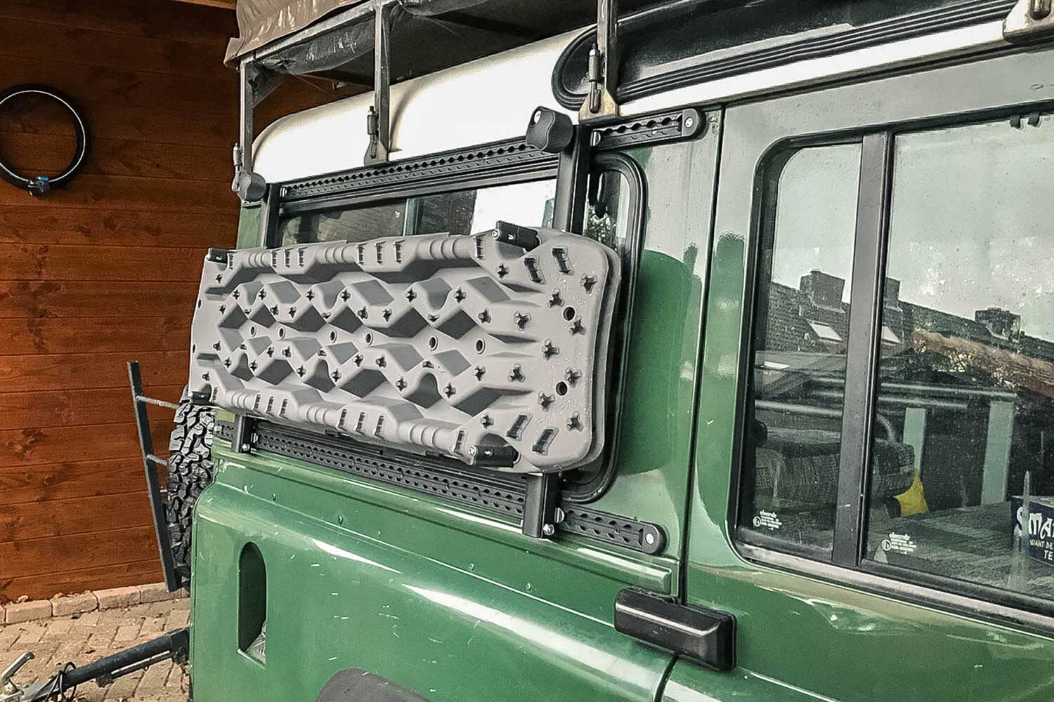 Tred Pro recovery boards mounted on the overland Defender
